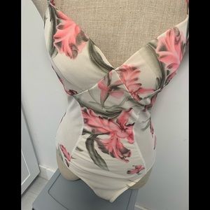 Beautiful and super sexy fun body suit. New with Tags.